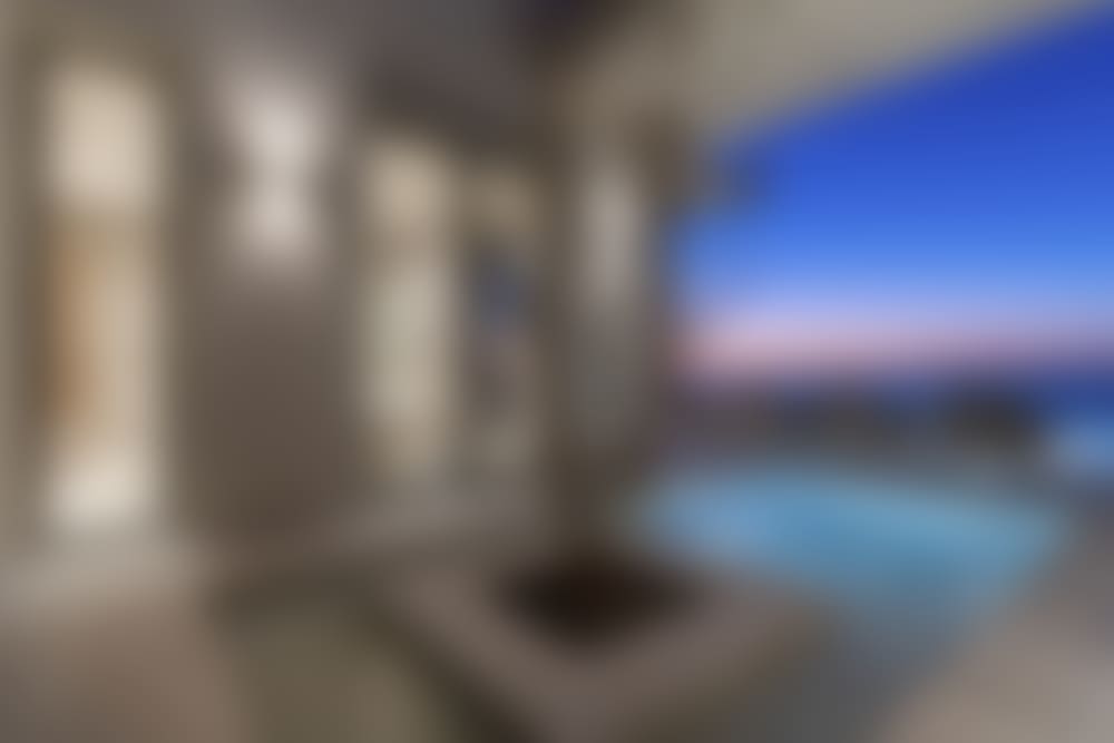 A recessed part of the main terrace between two of the bedrooms hosts a Jacuzzi.